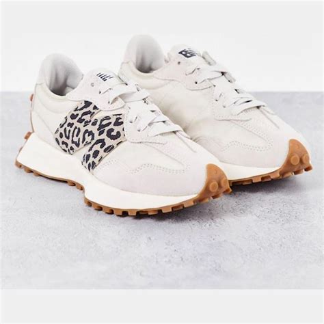 new balance 327 trainers in off white with leopard print detail